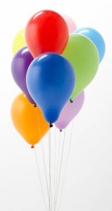 brightly colored bunch of balloons on strings