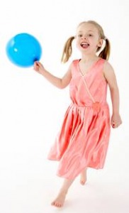 girl catching a balloon