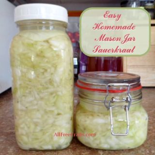 two mason jars of easy homemade sauerkraut