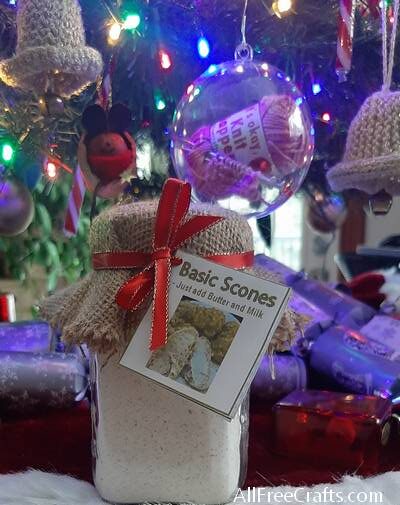 basic scones in mason jar with crocheted and knitted Christmas bells